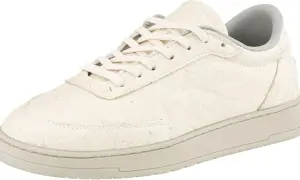 Ein beiger Sneaker aus innovativem Ananasleder mit Schnürung und grauer Innensohle. Nachhaltig und stylisch.